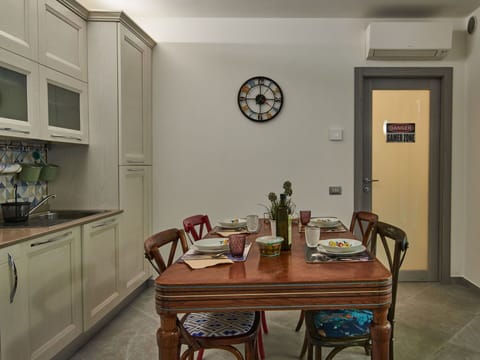 Furniture, Property, Table, Cabinetry, Countertop, Building, Chair, Wood, Interior Design, Lighting