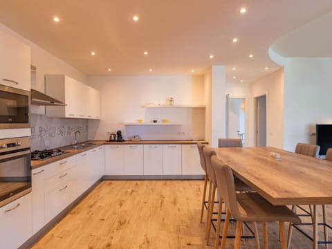 Furniture, Cabinetry, Table, Countertop, Building, Wood, Kitchen Appliance, Flooring, Kitchen, Floor