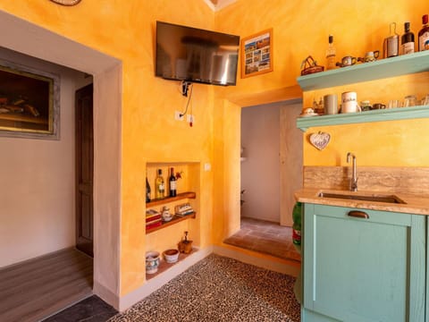 Cabinetry, Picture Frame, Wood, Orange, Interior Design, Architecture, Floor, Flooring, Countertop, Wall