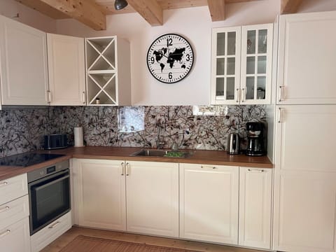 Cabinetry, Property, Countertop, Wood, Interior Design, Architecture, Kitchen, Building, Floor, Flooring