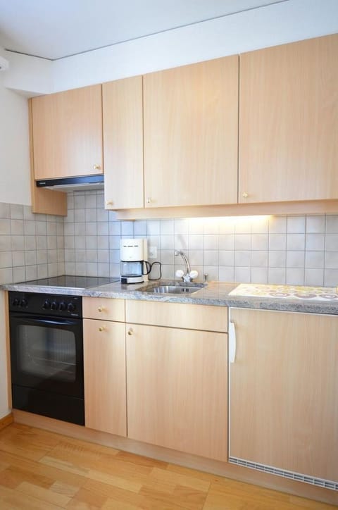 Cabinetry, Countertop, Kitchen Sink, Building, Sink, Kitchen, Kitchen Appliance, Kitchen Stove, Wood, Tap