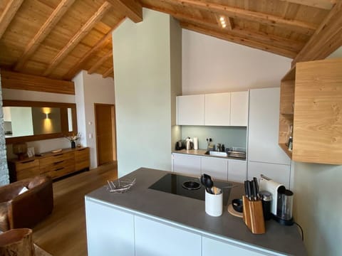 Property, Cabinetry, Countertop, Wood, Interior Design, Flooring, Kitchen Appliance, Kitchen, Floor, Living Room