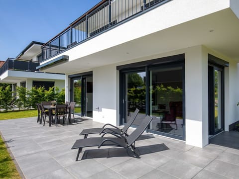 Building, Furniture, Plant, Table, Sky, Shade, Interior Design, Chair, Urban Design, Outdoor Furniture