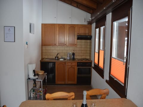 Cabinetry, Property, Furniture, Table, Wood, Interior Design, Flooring, Building, Countertop, Floor