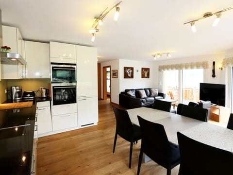 Furniture, Property, Table, Cabinetry, Countertop, Chair, Wood, Lighting, Kitchen, Kitchen Appliance