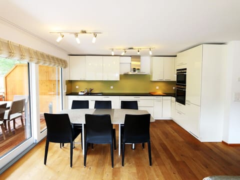 Furniture, Property, Countertop, Cabinetry, Kitchen, Wood, Chair, Living Room, Interior Design, Table