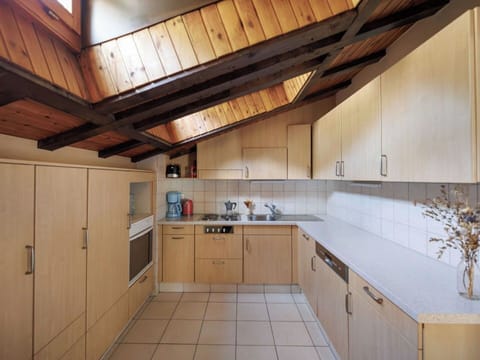 Kitchen, Countertop, Wood, Kitchen Appliance, Ceiling, Flooring, Major Appliance, Interior Design, Cabinetry, Kitchen Sink