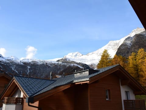 Sky, Cloud, Building, Mountain, Snow, Window, Nature, Slope, House, Wood