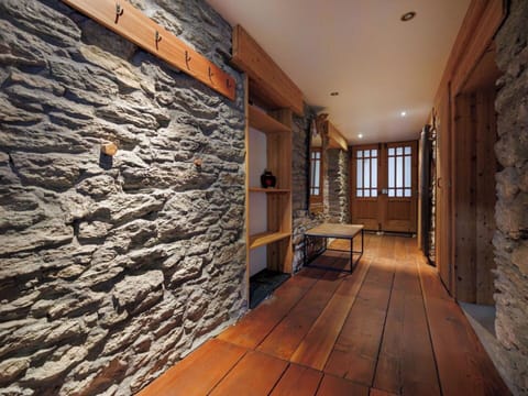 Wall, Flooring, Wood, Floor, Ceiling, Interior Design, Stone Wall, Door, Wood Flooring, Wood Stain