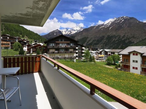 Sky, Cloud, Building, Property, Mountain, Plant, Nature, Natural Landscape, Architecture, Highland