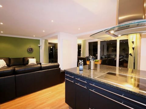 Furniture, Building, Couch, Interior Design, Table, Hall, Architecture, Flooring, Living Room, Floor