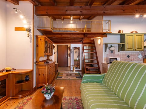 Couch, Furniture, Property, Interior Design, Living Room, Wood, Table, Floor, Picture Frame, Real Estate