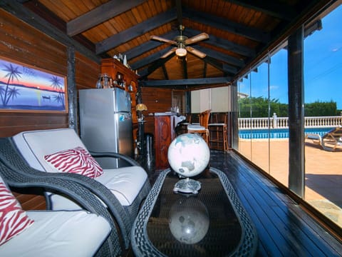 Plant, Building, Daytime, Property, Water, Sky, Blue, Azure, Tree, Arecales