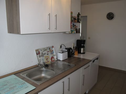 Kitchen Sink, Sink, Tap, Cabinetry, Property, Countertop, Plumbing Fixture, Kitchen, Kitchen Appliance, Interior Design