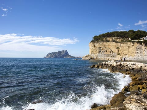 Cloud, Water, Sky, Azure, Natural Landscape, Watercourse, Coastal And Oceanic Landforms, Terrain, Bedrock, Mountain