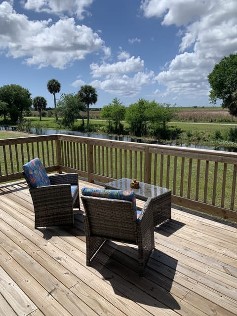 Back deck overlooking the canal with breathtaking sunsets. Patio furnitire.