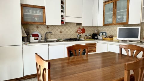 Fridge, oven, dining tables