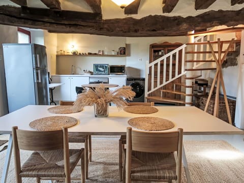 Furniture, Flooring, Interior Design, Wood, Floor, Table, Kitchen & Dining Room Table, Chair, Dining Room, Lighting