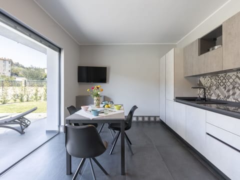 Property, Furniture, Table, Cabinetry, Plant, Wood, Interior Design, Building, Flooring