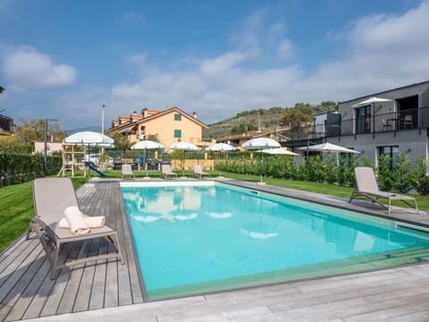 Water, Plant, Cloud, Sky, Furniture, Swimming Pool, Building, Azure, Chair, Window