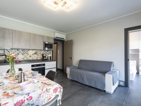 Furniture, Table, Interior Design, Plant, Couch, Flooring, Floor, Flower, Wood, Living Room