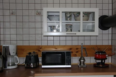 Microwave, stovetop, coffee/tea maker