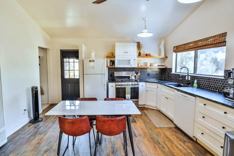 Perfect for family dinners or game nights, our dining table comfortably seats four for memorable vacation meals.