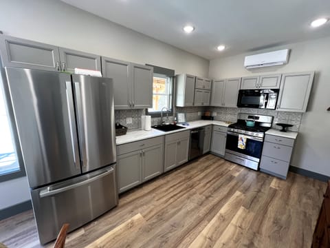 Nice new appliances adorn the kitchen