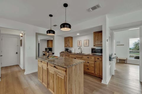 Full kitchen, with dual sinks.