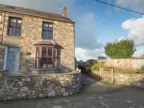 Outside view of Glenroy, driveway, front wall, front door