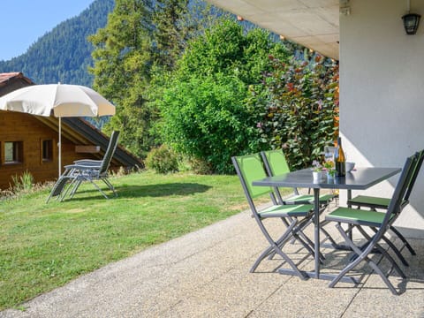 Plant, Property, Furniture, Nature, Shade, Botany, Outdoor Furniture, Sky, Table, Folding Chair