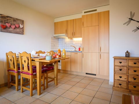 Cabinetry, Furniture, Property, Table, Wood, Lighting, Interior Design, Dresser, Drawer, Floor