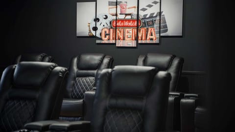 Imagine yourself reclining in luxury, popcorn in hand, enjoying a movie night in your private theater. This is where cinematic magic meets ultimate comfort.