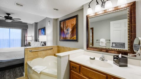 Shower, jetted tub, hair dryer, towels