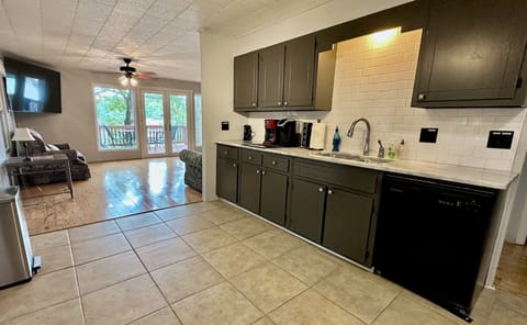 Spacious kitchen w/ easy access to open living & dining rooms