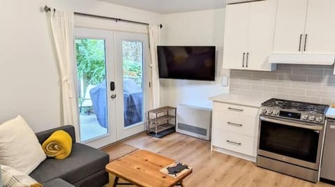 LIving room and TV, Kitchen and Patio Doors