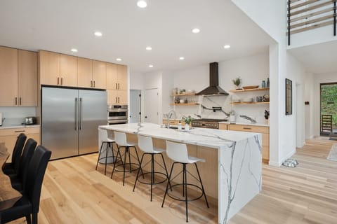 Kitchen with side by side fridge freezer