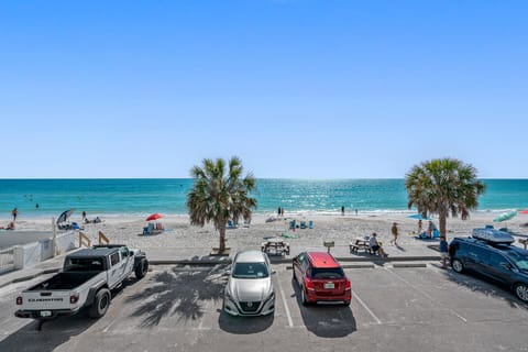 On the beach, sun loungers, beach towels