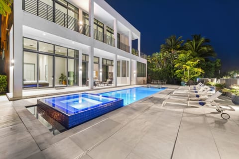 Expansive patio with loungers and dining