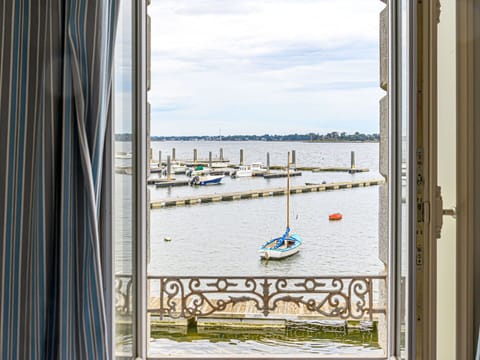 Sky, Plant, Cloud, Street Light, Urban Design, Road Surface, Tree, Building, Landscape, Road