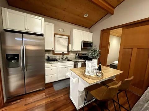 Full-size kitchen with a small eating area