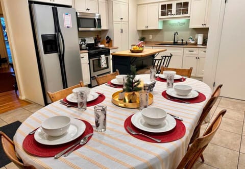 The Kitchen Has Modern Stainless Steel Appliances and is Brightly Lit