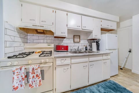 The kitchen has all newer appliances and cabinets.