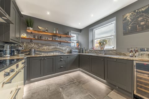 The beautiful kitchen has been kitted out with top of the range appliances