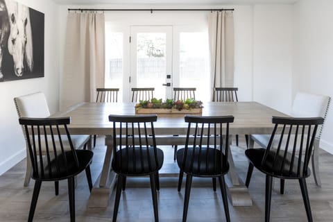 Dining area with expandable dining table for 12