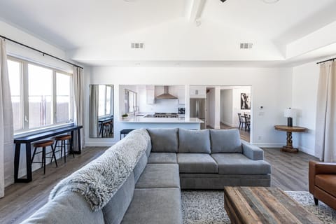 Living Room with Sofa Sleeper, fireplace, 75" Smart TV