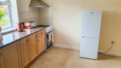 Fridge, microwave, oven, cookware/dishes/utensils