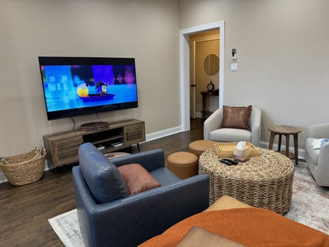 Living area | Smart TV, DVD player, books, printers