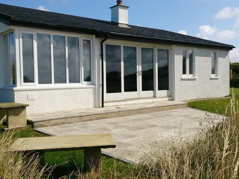 Rockfield from the garden, showing the patio area