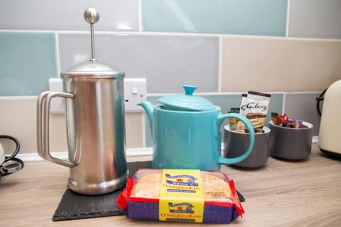 Teapot, cafetiere and Welsh cakes